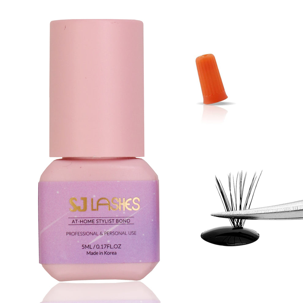 SJ LASHES At-Home Stylist Bond 5 ml black DIY lash glue with needle-nose cap, dip the cluster base only SJ LASHES At-Home Stylist Bond 5 ml black lash glue bottle with orange needle cap and a cluster lash being dipped into a small glue drop